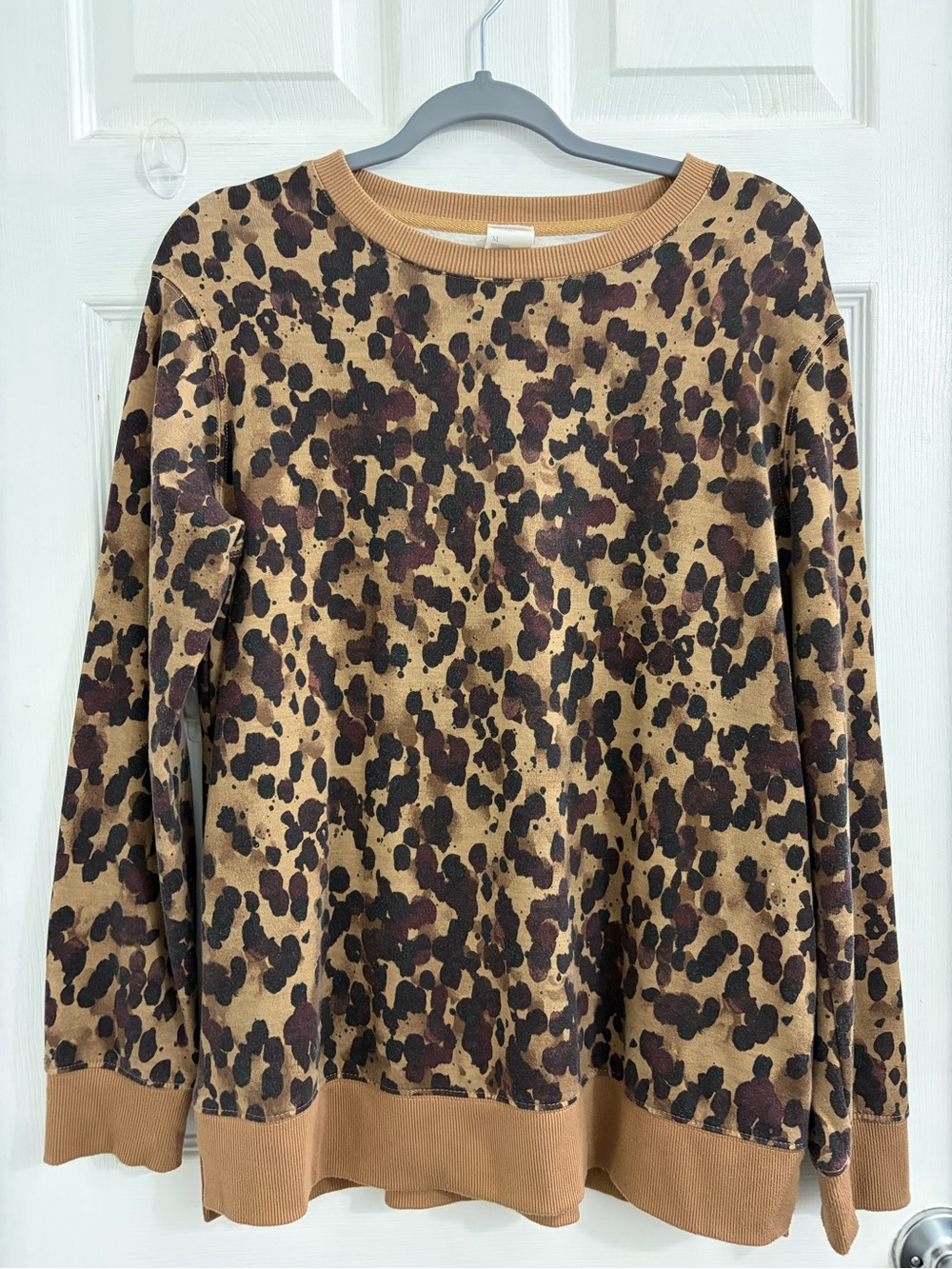 stars above Leopard Print Pullover Sweatshirt in Tan & Brown. Size medium